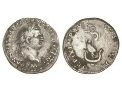 Denario. Acuñada el 80 d.C. TITO. Anv.: IMP. TITVS CAES. VESPASIAN. AVG. P. M. Cabeza laureada a derecha. Rev.: TR. P. IX IMP. XV COS. VIII P. P. Delfín enroscado en un áncora. 3,25 grs. AR. (Concreci
