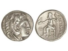 Tetradracma. 336-323 a.C. ALEJANDRO MAGNO. ACANTOS. Anv.: Cabeza de Hércules con piel de león a derecha. Rev.: Zeus entronizado a izquierda, detrás leyenda, delante símbolo. 17,24 grs. AR. Pátina. Mül