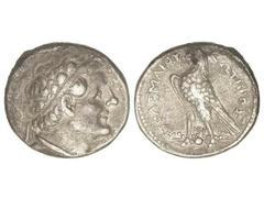 Tetradracma. 204-180 a.C. PTOLOMEO V. EGIPTO. Anv.: Cabeza diademada a derecha. Rev.: Águila en pie a izquierda sobre haz de rayos, alrededor leyenda. 13,81 grs. AR. Pátina. (Ligeras oxidaciones en ca