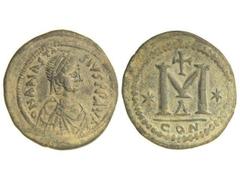 BYZANTINE COINS Follis. ANASTASIO I (480-518 d.C.). CONSTANTINOPLA. Anv.: D. N. ANASTASIVS PP. AVG. Busto diademado a derecha. Rev.: M grande, con estrellas a los lados, encima cruz, debajo A. En exer