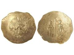 BYZANTINE COINS Aspron Trachy. JUAN II (1118-1143 d.C.). CONSTANTINOPLA. Anv.: Cristo entronizado, dando la bendición. Rev.: Juan II y San Jorge sosteniendo una cruz patriarcal. 4,26 grs. Electrón. (L