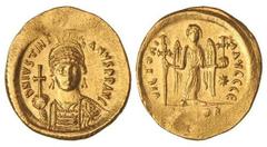 BYZANTINE COINS Sólido. JUSTINIANO I (527-565 d.C.). CONSTANTINOPLA. Anv.: D. N. IVSTINIANVS P. P. AVG. Busto de frente con globo crucífero. Rev.: VICTORIA AVGGG ¶. En exergo: (CON)OB, en el campo est