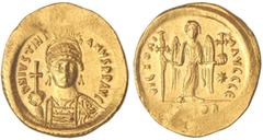 BYZANTINE COINS Sólido. JUSTINIANO I (527-565 d.C.). CONSTANTINOPLA. Anv.: D. M. IVSTINIANVS P. P. AVG. Busto de frente con globo crucífero. Rev.: VICTORIA AVGGG. En exergo: (CON)OB, en el campo estre