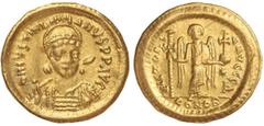 BYZANTINE COINS Sólido. JUSTINIANO I (527-565 d.C.). CONSTANTINOPLA. Anv.: D. N. IVSTINIANVS P. P. AVG. Busto de frente con lanza y escudo. Rev.: VICTORIA AVGGG ¶. En exergo: CONOB; en el campo estrel