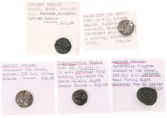 Ancient coins in lots Ancient coins in lots - A small lot ancient coins: 2 x AR Drachm and 1 x AE of Alexander III, an Indo/Scythian bronze Drachm of Azes II and a small bronze of Chios, Ionia )amphor