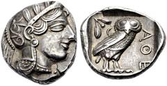 GRIECHISCHE MÜNZEN. ATTIKA. ATHEN. Tetradrachmon, 403-365 v. Chr. Athenakopf im Helm mit Lorbeerblättern n.r.; Ranke auf dem Helmkessel. Rv. Eule n.r., l. Mondsichel, Olive mit zwei Blättern. 17,16 g.