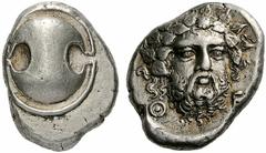 Coins of the Greeks Boeotia Thebes. Circa 405-395 BC. Stater (Silver, 11.97 g). Boeotian shield. Rev. Q-E Head of bearded Dionysos three-quarter facing, turned slightly to the right, wearing ivy wreat