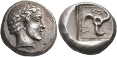 Greek DYNASTS OF LYCIA. Vekhssere I, circa 450-430 BC. Stater (Silver, 19 mm, 8.59 g, 1 h). Laureate head of Apollo to right. Rev. WEKHSS (in Lykian script) Large triskeles running clockwise; to left,