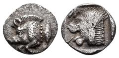 Greek MYSIA. Kyzikos. Circa 450-400 BC. Hemiobol (Silver, 7.5 mm, 0.33 g, 5 h). Forepart of boar to left; to right, tunny fish swimming upwards. Rev. Head of lion to left within a shallow incuse squar