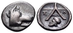 The Collection sans Pareille of Ancient Greek Fractions, Part III ARGOLIS. Argos. Circa 420/10-370 BC. Trihemiobol (Silver, 10 mm, 0.89 g, 7 h). Head of a wolf to right. Rev. Σ - Ω Large A; below, Cor