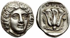 GREEK COINS Islands off Caria Rhodos. Rhodes . Circa 404-385 BC. Tetradrachm (Silver, 15.50 g 12). Head of Helios facing, turned slightly to the right. Rev. ΡOΔION Rose with bud to right; on left, gra