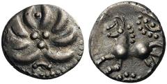 CELTIC COINS Britain Switzerland. Helvetii , mid 1st century BC. Quinarius (Silver, 12mm, 1.61 g), ‘Büschelquinar’. Palmette made from eight curved leaves; at the center, three pellets; below, crescen