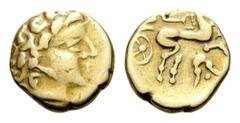 GAUL, uncertain tribe. Circa 3rd century BC. Quarter stater (Gold, 11mm, 1.84 g), imitation of a stater of Philip II of Macedon. Celticized head of Apollo to right. Rev. Horse galloping right, chariot