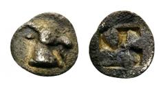 MACEDON, “Aigai”. Circa 485-470 BC. Hemiobol (Silver, 7mm, 0.19 g). Head of a goat to right. Rev. Quadripartite incuse square. Cf. CNG 138, 26 April 2006, lot 44 (tetartemorion). Cf. SNG Oxford 2232 v
