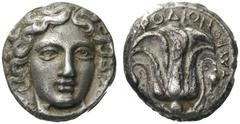 GREEK COINS Islands off Caria Rhodos. Rhodes, c . 408/7-404 BC. Tetradrachm (Silver, 21mm, 15.25g 12), signed by Tauro.... Head of Helios facing, turned slightly to the right. Rev. ΡΟΔΙΟΝ Rose with bu