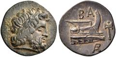 GREEK COINS Kings of Macedon. Demetrios I Poliorketes, 306-283 BC. (Bronze, 16 mm, 2.44 g, 12 h), uncertain mint in Caria, c. 290-286. Laureate and bearded head of Zeus to right. Rev. ΒΑ Prow of galle