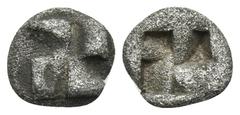 Greek IONIA. Uncertain. Circa 625-600 BC. One twenty-fourth stater (Silver, 6.5 mm, 0.34 g). Raised quadripartite swastika pattern, with crescents in each side. Rev. Incuse swastika pattern. Apparentl