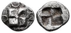 Greek IONIA. Uncertain mint. Circa 625-600 BC. 1/12 Stater (Silver, 9.5 mm, 0.99 g). Raised swastika pattern surrounded by crescents. Rev. Quadripartite incuse square. Cf. Savoca 34, 2019, 155 (Silver
