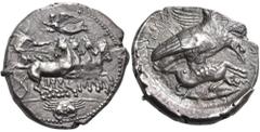 Greek SICILY. Akragas. Circa 410-406 BC. Tetradrachm (Silver, 28 mm, 17.20 g, 7 h). Male charioteer, holding the reins in both hands, driving quadriga galloping to right; above, Nike flying to left to