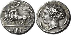 Greek Coins Syracuse. Decadrachm signed by Kimon circa 405-400, AR 43.21 g. Fast quadriga driven l. by charioteer, holding reins and kentron; in field above, Nike flying r. to crown him. In exergue, d