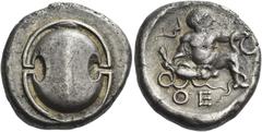 Greek Coins Thebes. Stater circa 425-325, AR 11.83 g. Boeotian shield. Rev. ΘE Infant Heracles seated facing on ground, head r., strangling snake in each hand; bow in upper l. field. Traité III 264 an