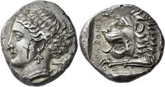 Greek Coins Cnidus Tetradrachm circa 350, AR 26 mm, 15.22 g. [K – N] Head of Aphrodite Euploia l., hair in sphendone, wearing earring and necklace; behind, prow l. Rev. Forepart of lion l., with open 