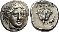 Greek Coins Rhodes. Tetradrachm circa 404-385, AR 24 mm, 15.26 g. Head of Helios facing three-quarters r. Rev. ΡΟΔΙΟΝ Rose; in lower field r., eagle standing r. with closed wings on rock. All within s