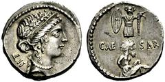 Julius Caesar Denarius, mint moving with Caesar 48-47, AR 4.13 g. Female head r., wearing diadem and oak wreath; behind, ^II. Rev. CAE – SAR Trophy with Gallic shield and carnyx ; below, captive seate