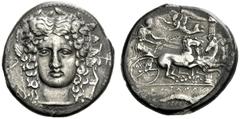 Greek Coins Catana Tetradrachm signed by Choirion circa 410, AR 16.51 g. Head of Apollo facing, wearing laurelwreath, his hair parted in the middle and flowing down at sides of his face; on l., a bow 