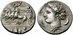 Greek Coins Syracuse Decadrachm signed by Euainetos circa 400, AR 43.33 g. Fast quadriga driven l. by charioteer, holding reins and kentron ; in field above, Nike flying r. to crown him. In exergue, d