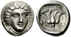 Greek Coins Island off Caria, Rhodes Tetradrachm circa 404-385, AR 15.24 g. Head of Helios facing three-quarters r. Rev. ΡOΔION Rose with bud to l.; in r. field, Φ / wreath. All within incuse square. 