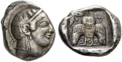 Greek Coins Attica, Athens Decadrachm circa 467-465, AR 41.52 g. Head of Athena r., wearing crested helmet, earring and necklace; bowl ornamented with spiral and three olive leaves. Rev. A - Θ - E Owl