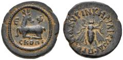 Greek Coins Ephesus Tessera early Imperial times, Æ 4.89 g. E - Φ Stag crouching l., head r.; in exergue, CKOΠI. Rev. KHΡIΛIΣ ΩΔE ΠΡOΣ ΠAΛΥΡIN Bee. Head, NC 1908, p. 281, 1. SNG Copenhagen 355. SNG vo