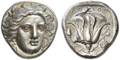 Greek Coins Islands off Caria, Rhodes Tetradrachm circa 380, AR 15.25 g. Facing head of Apollo, looking slightly to r., hair floating loose at sides of face. Rev. POΔION Rose with stem and bud; in r. 
