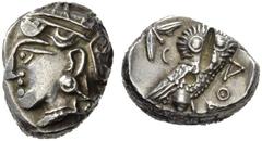 Greek Coins North-eastern Arabia imitations of Athenian tetradrachms. Tetradrachm, circa 4th 3rd century BC, AR 16.70 g. Helmeted head of Athena l. Rev. Owl, standing r., in upper l. field olive sprig