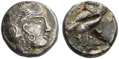 Greek Coins North-eastern Arabia imitations of Athenian tetradrachms. Tetradrachm, circa 4th 3rd century BC, AR 15.66 g. Helmeted head of Athena l. Rev. Owl, standing r., in upper l. field olive sprig