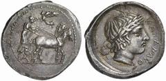 Greek Coins Catana No.: 66 Schätzpreis - Estimate CHF 35000 d=32 mm Tetradrachm work of the "Maestro della Foglia", circa 415-410, AR 16.28 g. Stationary quadriga r. driven by charioteer, wearing long