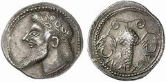 Greek Coins Naxos No.: 85 Schätzpreis - Estimate CHF 120000 d=23 mm Chalcidian drachm, circa 520–510, AR 5.57 g. Ivy-wreathed head of Dionysus l., with pointed beard and long hair in form of dots fall