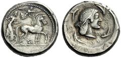 The M.L. Collection of Coins of Magna Graecia and Sicily Syracuse Tetradrachm circa 485-480, AR 17.37 g. Slow quadriga driven r. by bearded charioteer, wearing chiton and holding kentron and reins; ab