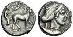 The M.L. Collection of Coins of Magna Graecia and Sicily Syracuse Tetradrachm circa 430, AR 17.34 g. Slow quadriga driven r. by charioteer holding reins and kentron ; in field above, Nike flying r. to