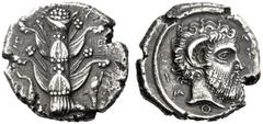 Greek Coins Cyrene Tetradrachm circa 380, AR 13.20 g. [K] – Y / P – E Silphium plant with four leaves; at base, two dolphins, one swimming downwards and the other upwards. Rev. AP[…]OSIOS Head of Zeus
