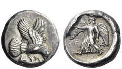 Greek Coins Elis, Olympia Stater circa 450-440, AR 12.35 g. Eagle flying r., grasping hare with its talons and tearing at it with its beak. Rev. Nike running l., holding wreath in extended r. hand and