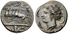 GREEK COINS Syracuse Decadrachm signed by Euainetos circa 400, AR 42.44 g. Fast quadriga driven l. by charioteer, holding reins and kentron; in field above, Nike flying r. to crown him. In exergue, di