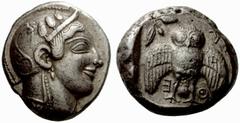 Greek Coins Attica, Athens No.: 183 Schätzwert/Estimation: CHF 180000.- d=32 mm Decadrachm circa 465, AR 42.13 g. Head of Athena r., wearing crested helmet, earring and necklace; bowl ornamented with 