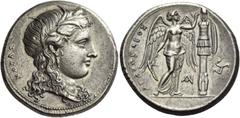 Greek coins Syracuse. Tetradrachm circa 310-305, AR 17.04 g. KOPAΣ Head of Kore-Persephone r., wearing barley wreath, earring with drop pendant and necklace; hair flowing freely over neck in loose cur