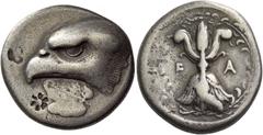 Greek coins Elis, Olympia. Stater signed by DA..., circa 408 BC, the 93rd Olympiad, AR 11.53 g. Head of eagle l., beneath, white poplar leaf inscribed ΔΑ. Rev. F – A winged thunderbolt; all within wre