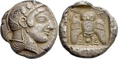 Greek coins Attica, Athens. Decadrachm circa 467-465, AR 42.53 g. Head of Athena r., wearing crested helmet, earring and necklace; bowl ornamented with spiral and three olive leaves. Rev. A – Θ – E Ow