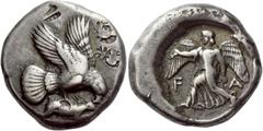 Greek Coins Elis, Olympia Stater circa 450-440, 82nd-87th Olympiad, AR 12.38 g. Eagle flying r., grasping hare with its talons and tearing at it with its beak. Rev. Nike running l., holding wreath in 