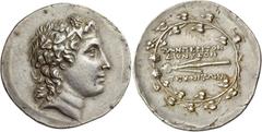 Greek Coins Ionia, Teos (?) Tetradrachm, artist of Dionysus, II century BC, AR 16.86 g. Head of Dionysus r., wearing mitre and ivy-wreath. Rev. ΤΩΝ ΠΕΡΙ ΤΟΝ / ΔΙΟΝΥΣΙΟΝ / ΤΕΧΝΙΤΩΝ Filleted thyrsus; al