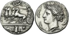 Greek Coins Sicily, Syracuse. Decadrachm signed by Euainetos circa 405-400, AR 36 mm, 41.47 g. Fast quadriga driven l. by charioteer, holding reins and kentron; in field above, Nike flying r. to crown